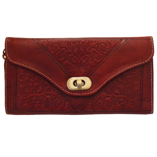 Handcrafted Moroccan tri-fold leather purse with embossed detailing and multiple compartments for cards and coins