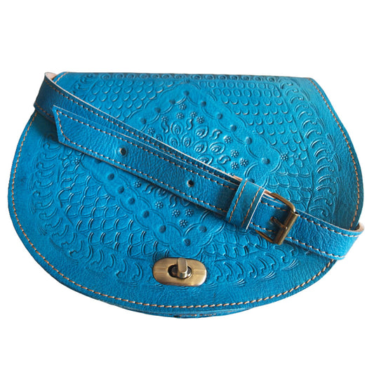 Temara light blue saddle bag handcrafted from embossed Moroccan leather with adjustable strap and dual compartments