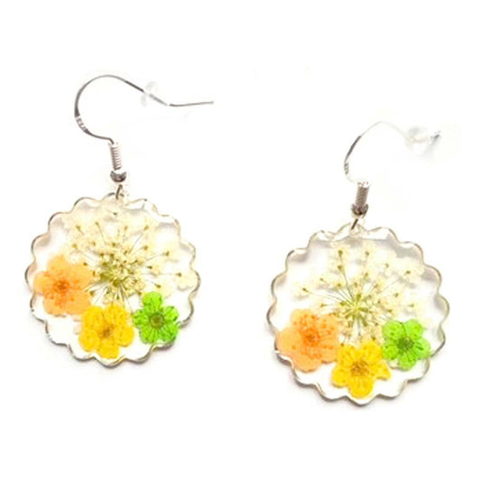 Sterling silver earrings with three forget me not real flowers encased in resin