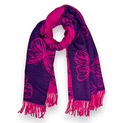 A vibrant fuchsia pink and deep purple reversible butterfly print scarf made from a 30% cashmere blend, featuring a 320g weight and classic tassel fringe.