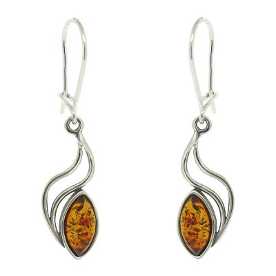 Sterling silver double wave drop earrings featuring a polished oval piece of Baltic amber.