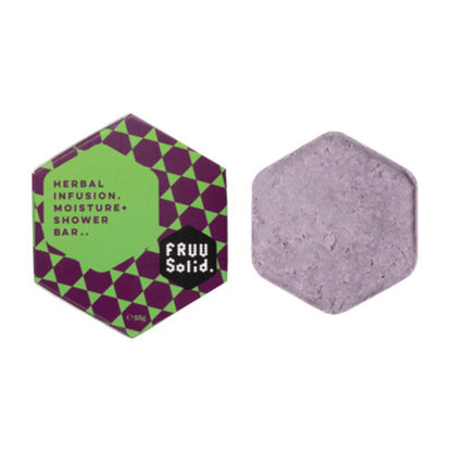 Fruu Herbal Infusion Moisture+ Shower Bar 55g shown as a solid purple hexagonal bar next to its green and purple patterned cardboard box.
