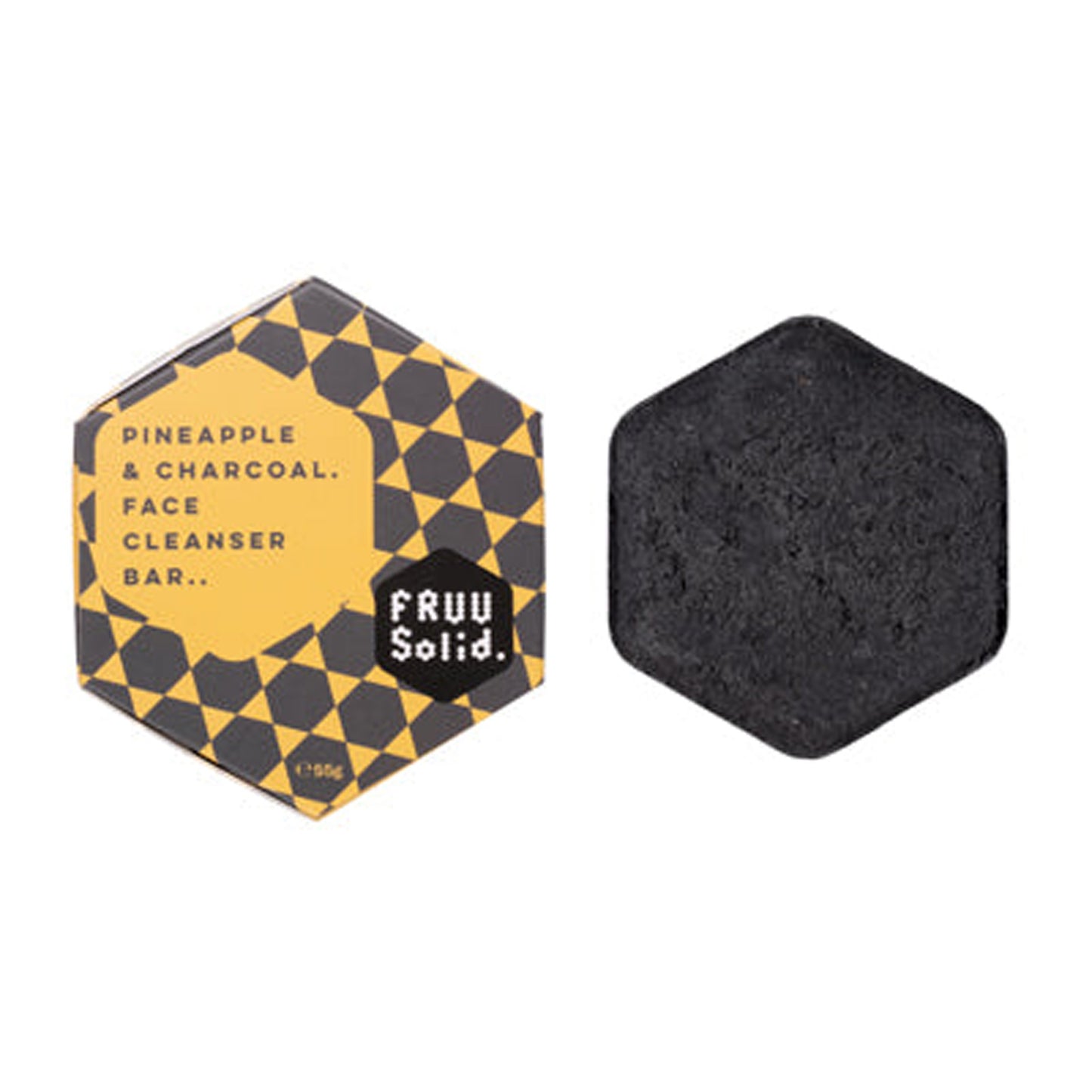 Fruu Pineapple and Charcoal Face Cleanser Bar 55g showing the solid black hexagonal bar next to its yellow and black checkered gift box. 