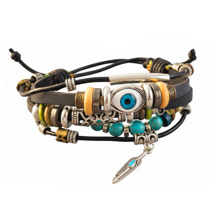 Multistrand talisman evil eye leather bracelet with various charms on a wooden surface