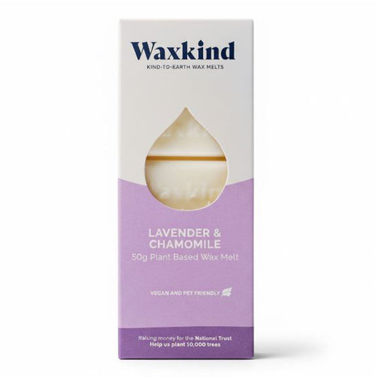 Front of white and lilac Waxkind packaging featuring a droplet-shaped window showing the light-coloured wax melt inside. Text reads: Waxkind Kind-To-Earth Wax Melts, Lavender & Chamomile, 50g Plant Based Wax Melt, Vegan and Pet Friendly. Bottom banner mentions raising money for the National Trust to help plant 10,000 trees.
